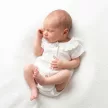 Zyzio & Zuzia kislány 3 részes muszlin baba szett bodyval, vállpántos szoknyával és hajpánttal púderrózsaszín 56