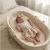 Zyzio & Zuzia kislány 3 részes muszlin baba szett bodyval, vállpántos szoknyával és hajpánttal homokbézs 62