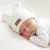 Zyzio & Zuzia uniszex KAZUM kötött baba sapka fülecskékkel kókuszkrém 80/86 (46-48 cm)
