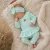 Zyzio & Zuzia kislány 3 részes baba szett bodyval, szoknyás leggingsszel és hajpánttal mentazöld 68