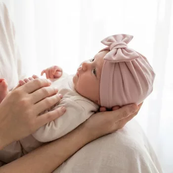   Zyzio & Zuzia kislány egyrétegű pamut babasapka masnival púderrózsaszín 6-12 hó